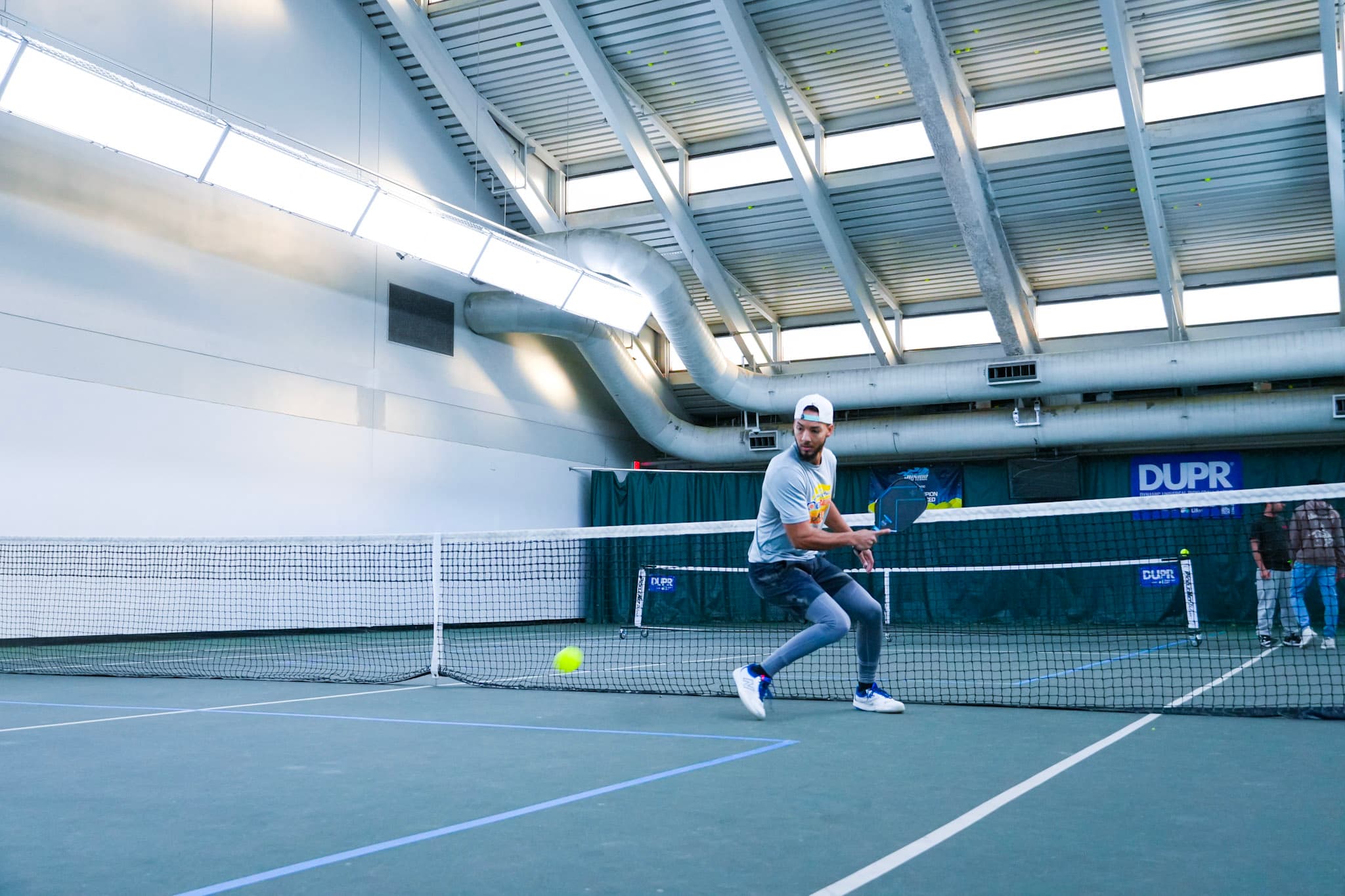 Chill N' Dill — player hitting at the net, ball in frame