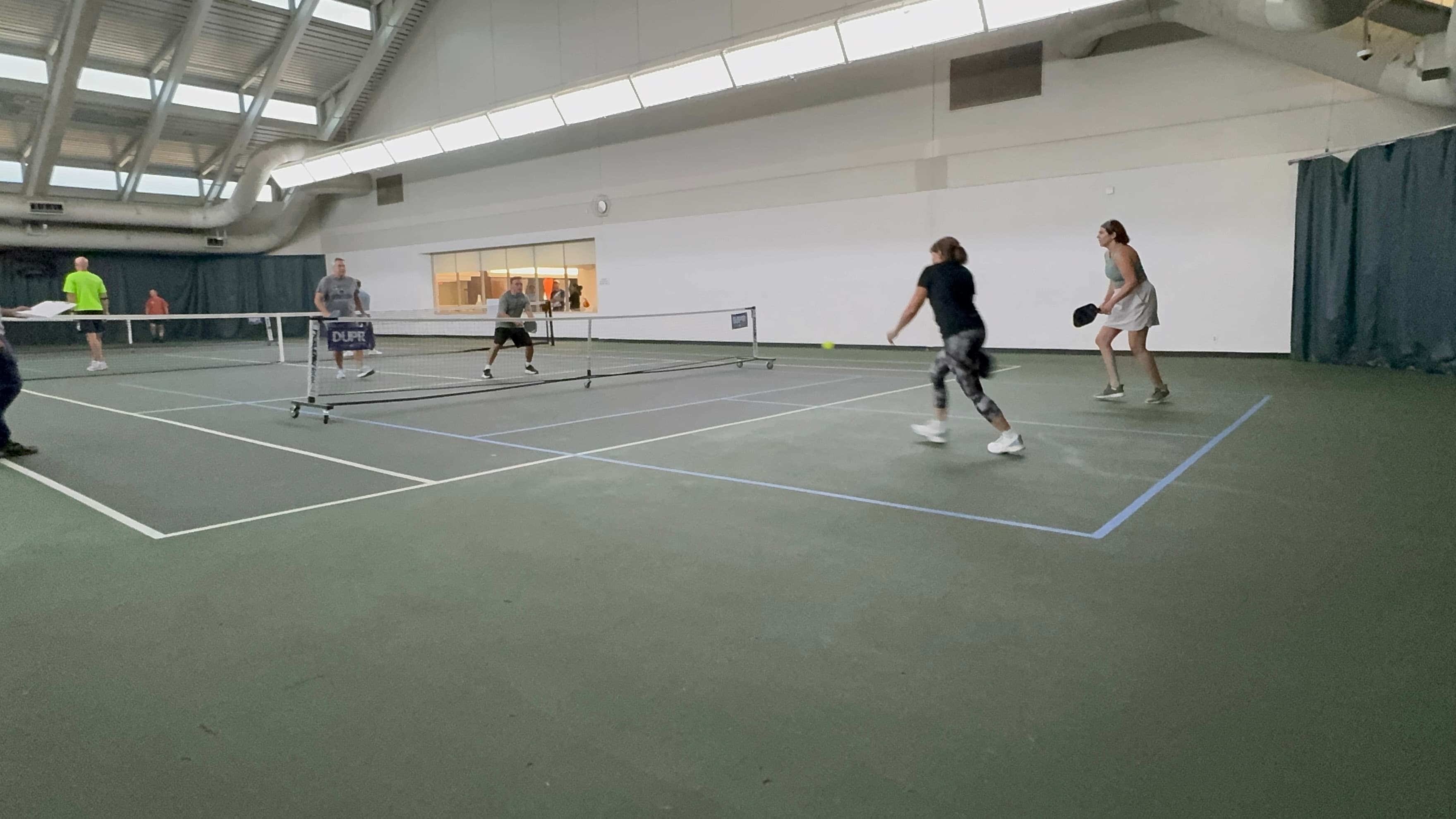 Chill N' Dill — wide court view with players in action